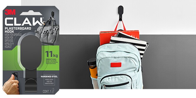 A backpack hung on a wall with a 11 kg 3M CLAW™ Plasterboard Hook
