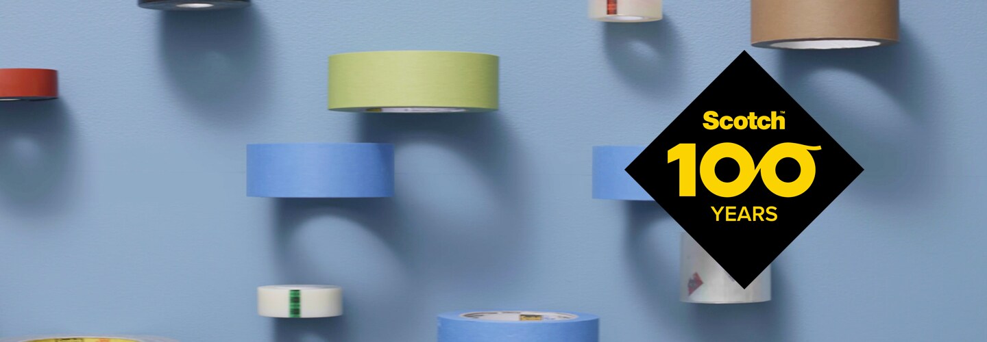 Two Engineers with security hermet in the field of wind turbines.