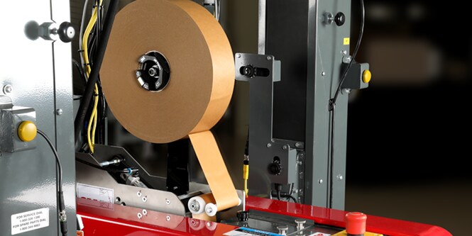 Paper sealing tape in a an automated sealer.
