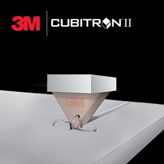 Illustration of abrasive grain cutting a surface with 3M Cubitron II logo abovev

