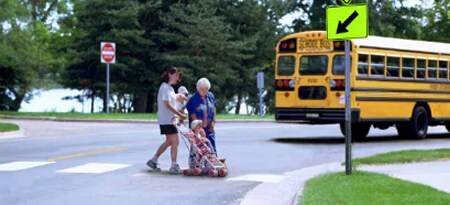 Family crossing a road
