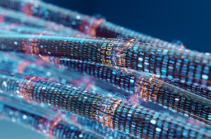 High-tech graphic of a bundle of cable, each cable is wrapped in a digital overlay of text and numbers.