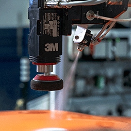 Close up of robotic arm of 3m™ Finesse-it™ Robotic Paint Repair System