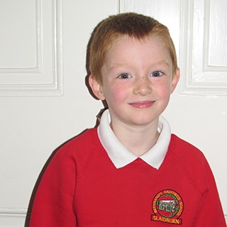Andrew, a student at Brennand's Endowed Primary School