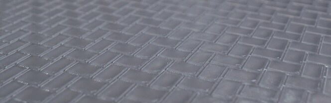 Close-up of 3M™ Trizact™ CMP Pad with groove design
