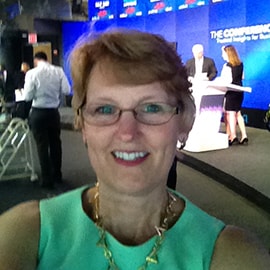 3M employee Dawn McGinley getting ready to help ring the stock market closing bell.