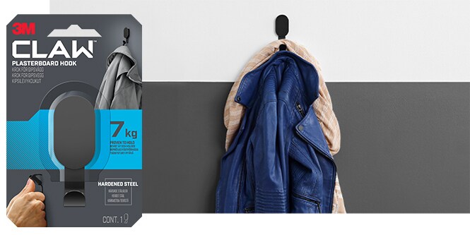 A jacket hung on a wall with a 7 kg 3M CLAW™ Plasterboard Hook
