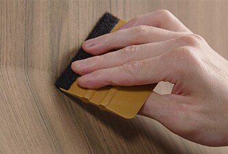 men taping shipping boxes in warehous
