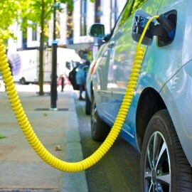 Electric car being charged