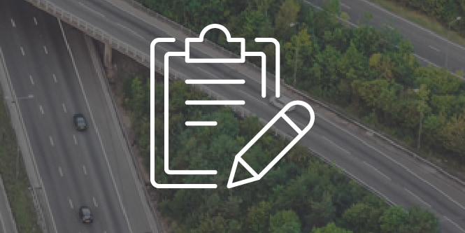 Checklist icon over a desaturated background of a highway.
