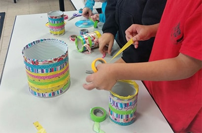 Kids use 3M washi tape and other supplies to learn more about sustainability.