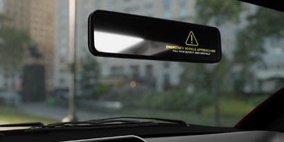 Automotive rear view mirror with electronic display.
