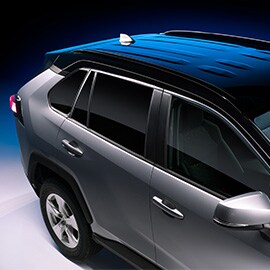 Angled view of premium windows on the passenger side of a luxury SUV