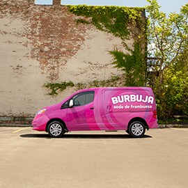 Graphics and signage burbuja design on vehicle