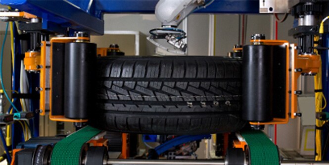 Automotive wheel and tire on a balance rack