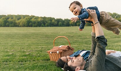 Family holding baby
